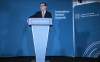 Britain's Prime Minister Andy Burnham delivers a speech at the The Innovation Nation Summit at Bruntwood SciTech in Manchester, England, Friday Oct. 9, 2026. (Christopher Furlong/Pool Photo via AP)