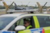 A B1 bomber prepares to take off as police officers man a checkpoint near RAF Fairford air base, in Fairford, England Tuesday, Sept. 29, 2026. THE CANADIAN PRESS/AP-Alastair Grant