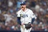 Tampa Bay Rays pitcher Drew Rasmussen celebrates after striking out Cleveland Guardians' José Ramírez during the fifth inning in Game 1 of an American League Championship Series baseball game in St. Petersburg, Fla. Monday, Oct. 12, 2026. (AP Photo/David J. Phillip)