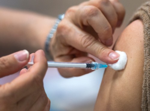 A person gets the Pfizer COVID-19 vaccination at a mobile clinic for members of First Nations and their partners, Friday, April 30, 2021 in Montreal. THE CANADIAN PRESS/Ryan Remiorz