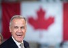 Prime Minister Mark Carney announces a new federal heat pump rebate program while visiting Dettson, a manufacturer of residential and commercial HVAC systems in Sherbrooke, Que., on Thursday, Oct. 8, 2026. THE CANADIAN PRESS/Christinne Muschi