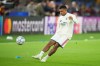 Real Madrid's Kylian Mbappe warms up prior to the start of a Champions League opening phase soccer match between Roma and Real Madrid, in Rome, Wednesday, Oct.14, 2026. (AP Photo/Alessandra Tarantino)
