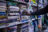 A customer browses for books at a bookstore in Harare, Zimbabwe, Wednesday, Oct. 14, 2026. (AP Photo/Aaron Ufumeli)