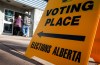 Voters arrive to cast their referendum vote at an advance polling station in Calgary, Tuesday, Oct. 13, 2026. THE CANADIAN PRESS/Jeff McIntosh