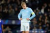 Manchester City's Erling Haaland reacts after PSG's Maghnes Akliouche scoree their fourth goal during the Champions League opening phase soccer match between Manchester City and Paris Saint-Germain in Manchester, England, Wednesday, Oct. 14, 2026. (AP Photo/Dave Thompson)