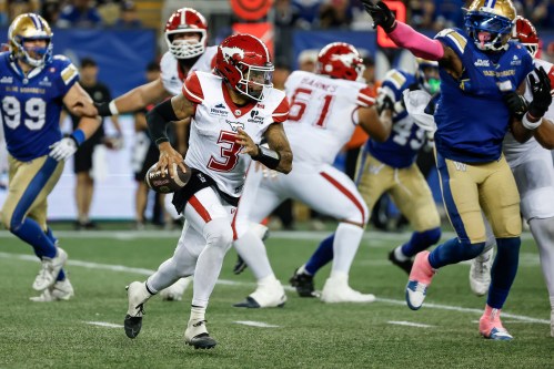 Calgary Stampeders quarterback Vernon Adams Jr. (3) looks for a receiver during second half CFL football action against the Winnipeg Blue Bombers in Winnipeg on Saturday, Oct. 10, 2026. THE CANADIAN PRESS/John Woods