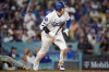 Los Angeles Dodgers designated hitter Shohei Ohtani (17) follows through on a base hit during the eighth inning of Game 3 of baseball's National League Championship Series between the Milwaukee Brewers and the Los Angeles Dodgers, Wednesday, Oct. 14, 2026, in Los Angeles. (AP Photo/Gregory Bull)