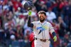 Tampa Bay Rays' Junior Caminero reacts after striking out against the Cleveland Guardians during the sixth inning in Game 3 of an American League Championship Series baseball game in Cleveland, Thursday, Oct. 15, 2026. (AP Photo/David J. Phillip)