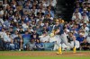 Milwaukee Brewers center fielder Garrett Mitchell follows through on his solo home run during the sixth inning of Game 4 of baseball's National League Championship Series between the Milwaukee Brewers and the Los Angeles Dodgers, Thursday, Oct. 15, 2026, in Los Angeles. (AP Photo/Mark J. Terrill)