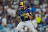 Milwaukee Brewers pitcher Aaron Ashby celebrates the final out of Game 4 of baseball's National League Championship Series between the Milwaukee Brewers and the Los Angeles Dodgers, Thursday, Oct. 15, 2026, in Los Angeles. (AP Photo/Ashley Landis)