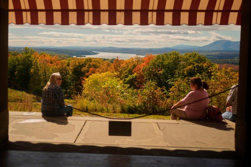 Colorful foliage adds to the view overlooking the Hudson River and Catskill Mountains at Olana, the former home of celebrated painter Frederic Church, Monday, Oct. 12, 2026, in Hudson, N.Y. (AP Photo/Robert F. Bukaty)
