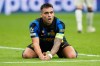 Inter Milan's Lautaro Martinez reacts after missing a scoring chance during the Champions League opening phase soccer match between Inter Milan and Club Brugge in Milan, Italy, Tuesday, Oct. 13, 2026. (AP Photo/Luca Bruno)