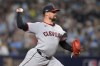 Cleveland Guardians pitcher Shawn Armstrong throws against the Tampa Bay Rays during the seventh inning in Game 2 of an American League Championship Series baseball game in St. Petersburg, Fla. Tuesday, Oct. 13, 2026. (AP Photo/Phelan M. Ebenhack)