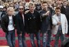 Backstreet Boys Brian Littrell (left), AJ McLean, Nick Carter, Kevin Richardson, and Howie Dorough pose for photographers as they arrives at the Much Music Video Awards in Toronto on June 19, 2005.  (CP PHOTO/Tobin Grimshaw)