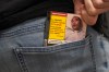 An example pack showing new cigarette package warnings is seen in a photo illustration made in Toronto, Saturday, July 18, 2026. THE CANADIAN PRESS/Giordano Ciampini