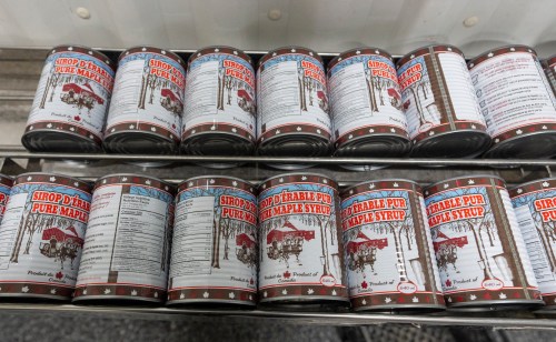 Cans of maple syrup wait to be processed at Érablière Coté et Fils in Roxton Pond, Que., on March 9, 2026. THE CANADIAN PRESS/Christinne Muschi
The Canadian Press