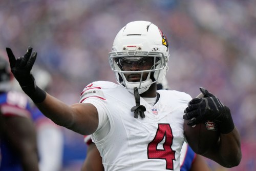Arizona Cardinals running back Jeremiyah Love celebrates a first down run against the New York Giants during an NFL football game, in East Rutherford, N.J., Sunday, Oct. 4, 2026. (AP Photo/Seth Wenig)