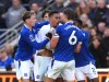 Tempers fray between Chelsea's Morgan Rogers, center, and Everton's James Tarkowski, resulting in yellow cards to both players, during the English Premier League soccer match between Everton and Chelsea in Liverpool, England, Saturday, Oct. 17, 2026. (Mike Egerton/PA via AP)