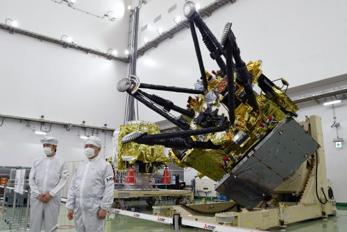 The Japan Aerospace Exploration Agency unveils a spacecraft for its Martian Moons eXploration mission at the Tanegashima Space Center in Minamitane, southwestern Japan, Aug. 13, 2026. (Yuika Kawazoe/Kyodo News via AP)