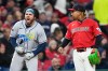 Tampa Bay Rays' Jonathan Aranda celebrates after RBI-single as Cleveland Guardians third baseman José Ramírez looks on during the seventh inning in Game 4 of an American League Championship Series baseball game in Cleveland, Saturday, Oct. 17, 2026. (AP Photo/David J. Phillip)