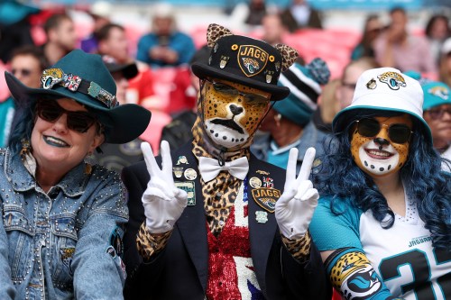 Jacksonville Jaguars take their seats ahead of an NFL football game against Houston Texans in London, Sunday, Oct. 18, 2026. (AP Photo/Ian Walton)
