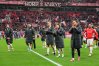 Freiburg's players walk in coats disappointed to their fans after losing the German Bundesliga soccer match between Bayer Leverkusen and SC Freiburg in Leverkusen, Germany, Sunday, Oct. 18, 2026. (AP Photo/Martin Meissner)