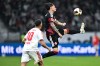 Eintracht Frankfurt's Robin Koch, right, leaps to control the ball ahead of 1. FC Köln's Said El Mala during a Bundesliga soccer match, Friday, Oct. 16, 2026, in Frankurt, Germany. (Florian Wiegand/dpa via AP)