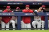 Members of the Cleveland Guardians watch during their lose against the Tampa Bay Rays in Game 5 of an American League Championship Series baseball game in Cleveland, Sunday, Oct. 18, 2026. (AP Photo/David J. Phillip)