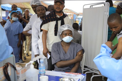 Health care workers queue to receive a dose of Ervebo vaccine against the Ebola virus in Beni, North Kivu province, eastern Congo, Friday, Oct. 16, 2026. (AP Photo/Sebastien Kitsa Musayi)