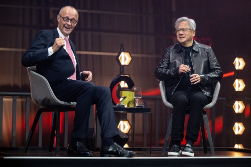 German Chancellor Friedrich Merz, left, and Nvidia CEO Jensen Huang, attend the opening ceremony of the 