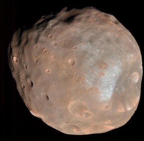 This photo provided by NASA/JPL-Caltech/University of Arizona, taken with NASA's Mars Reconnaissance Orbiter, shows Phobos, one of Mars' moons, on March 23, 2008. (NASA/JPL-Caltech/University of Arizona via AP)
