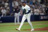 Tampa Bay Rays pitcher Freddy Peralta celebrates the end of the top of the fourth inning against the Cleveland Guardians in Game 6 of an American League Championship Series baseball game in St. Petersburg, Fla. Monday, Oct. 19, 2026. (AP Photo/David J. Phillip)