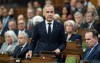 Prime Minister Mark Carney speaks about the incident at CFB Wainwright as he rises in the House of Commons in Ottawa, Monday, Oct. 19, 2026. THE CANADIAN PRESS/Adrian Wyld