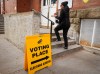 A voter enters a polling station to cast their vote in the Alberta referendum in Calgary, Monday, Oct. 19, 2026. THE CANADIAN PRESS/Jeff McIntosh