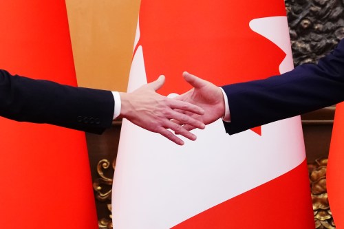 Prime Minister Mark Carney, left, shakes hands with President of China Xi Jinping at the Great Hall of the People in Beijing, China on Friday, Jan. 16, 2026. THE CANADIAN PRESS/Sean Kilpatrick