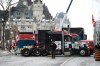 Trucks are seen in front of the Chateau Laurier hotel as a protest marked by gridlock and blaring horns reached its 14th day in Ottawa on Thursday, Feb. 10, 2022. THE CANADIAN PRESS/Justin Tang