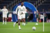 Real Madrid's Vinicius Junior warms up before the Champions League opening phase soccer match between Real Madrid and Leipzig in Madrid, Wednesday, Oct. 21, 2026. (AP Photo/Bernat Armangue)