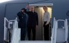 Prime Minister Mark Carney and his wife Diana Fox Carney board a government plane in Ottawa, Wednesday, Oct. 21, 2026. THE CANADIAN PRESS/Adrian Wyld