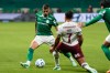 Andreas Pereira of Brazil's Palmeiras, left, is challenged by Hulk of Brazil's Fluminense during a Copa Libertadores semifinal second leg soccer match in Sao Paulo, Wednesday, Oct. 21, 2026. (AP Photo/Andre Penner)