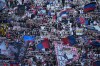 Lyon's fans chant slogans during the Europa League opening phase soccer match between Lyon and Crystal Palace in Lyon, France, Thursday, Oct. 15, 2026. (AP Photo/Laurent Cipriani)