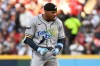 Tampa Bay Rays' Chandler Simpson celebrates a double against the Cleveland Guardians during the third inning in Game 5 of an American League Championship Series baseball game in Cleveland, Sunday, Oct. 18, 2026. (AP Photo/Phil Long)
