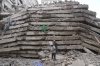 Security forces and civil defense work after a multi-story building collapsed in Nairobi, Kenya, Friday, Oct. 23, 2026. (AP Photo/Brian Inganga)