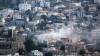 FILE - Smoke rises after an attack by Houthi rebels on the city of Taiz, Yemen, on Oct. 21, 2015. (AP Photo/Abdulnasser Alseddik, File)
