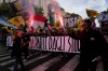 Members of right-wing student groups march through the streets of Rome, Saturday, Oct. 24, 2026, during a demonstration called 