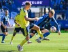 Nashville SC's Sam Surridge, left, challenges CF Montreal's Hennadii Synchuk during first half MLS soccer action in Montreal, on Saturday, Oct. 24, 2026. THE CANADIAN PRESS/Graham Hughes