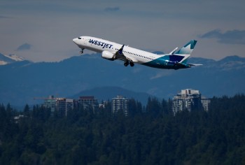 A WestJet Boeing 737 Max aircraft takes off from Vancouver International Airport, in Richmond, B.C., on Friday, July 31, 2026. THE CANADIAN PRESS/Darryl Dyck