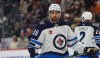 Winnipeg Jets defenseman Mario Ferraro in the first period of an NHL preseason hockey game Friday, Sept. 25, 2026, in Denver. (AP Photo/David Zalubowski)