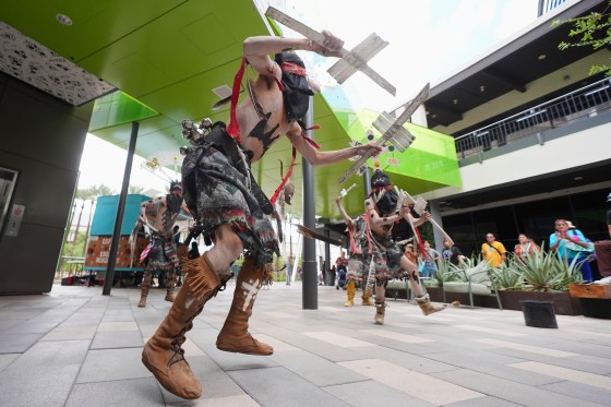 Members of ChÄbÄ“tÅ« Apache Crown Dancers perform a traditional dance at an Indigenous Peoples Day event in Phoenix, Arizona on Monday. (Ross D. Franklin / The Associated Press files)