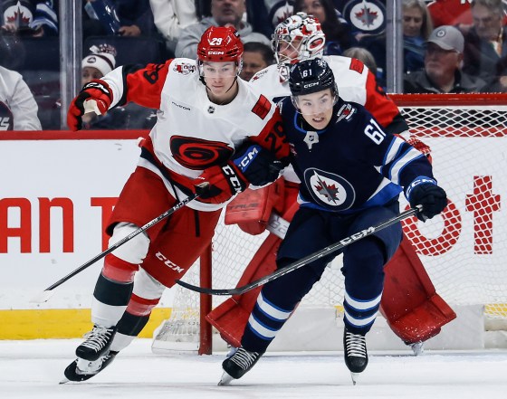 Carolina Hurricanes' Bradly Nadeau (29) defends against Winnipeg Jets' Viggo Bjorck (61) during the Oct. 17 game. (John Woods / The Canadian Press files)