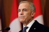 Prime Minister Mark Carney delivers a statement on Parliament Hill following a deadly fire at Canadian Forces Base Wainwright in Alberta, in Ottawa on Sunday, Oct. 18, 2026. THE CANADIAN PRESS/Patrick Doyle